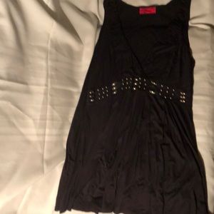 Women’s black sleeveless blouse.